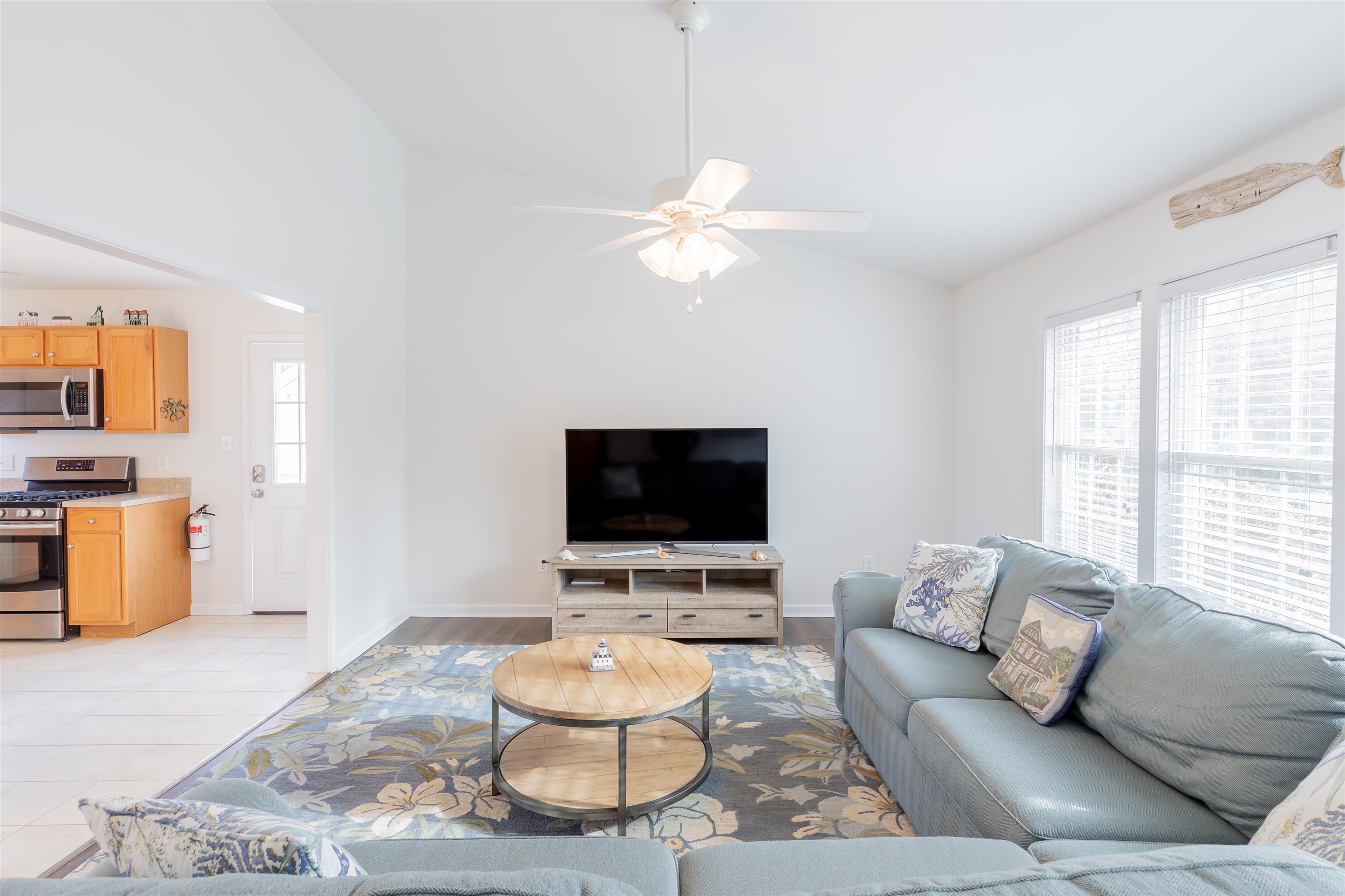 103 Avalon Road Cape May, NJ 08204 - Photo 4 of 33 a living room with furniture and a flat screen tv