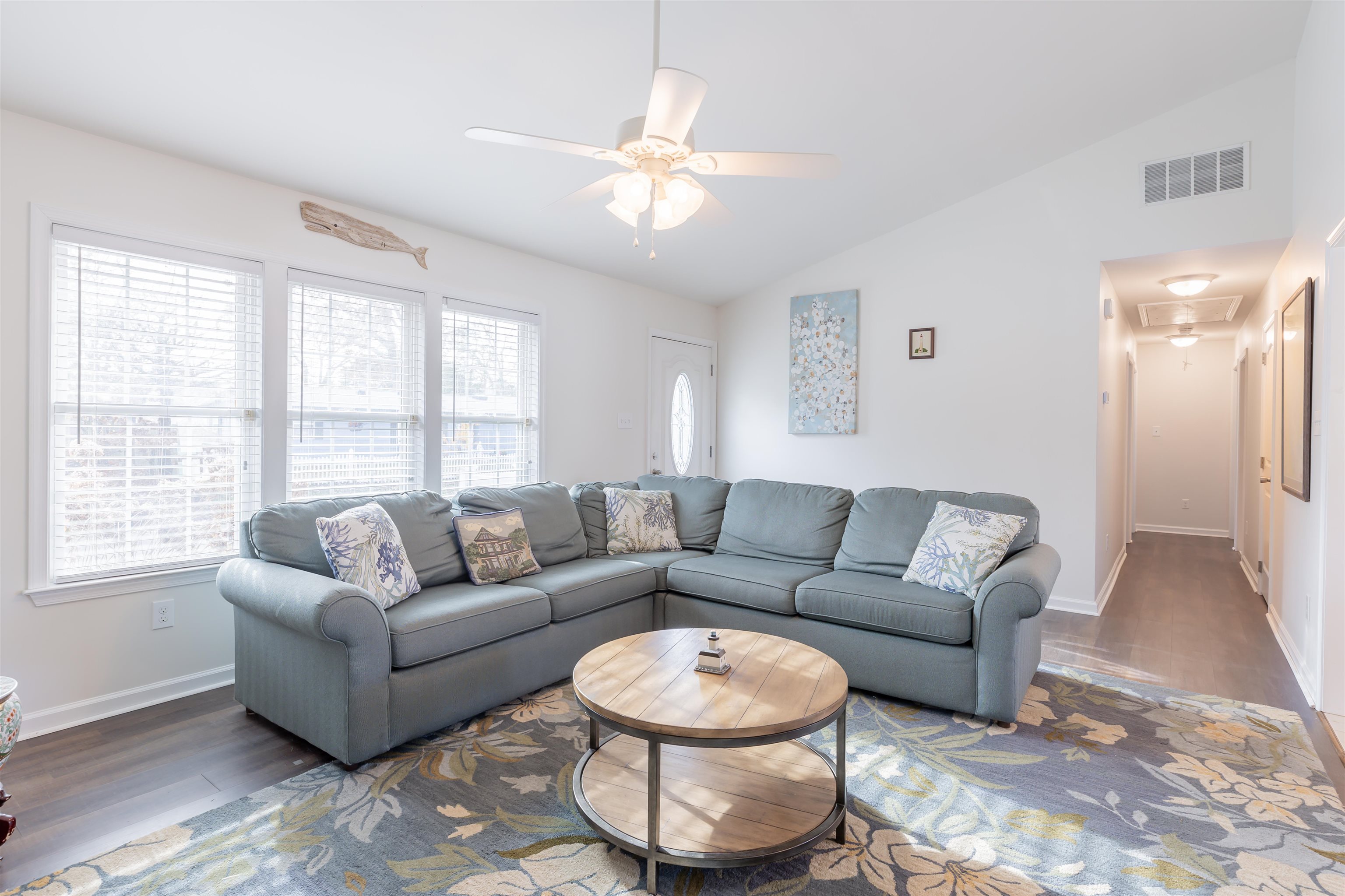 103 Avalon Road Cape May, NJ 08204 - Photo 7 of 33 a living room with furniture and a large window