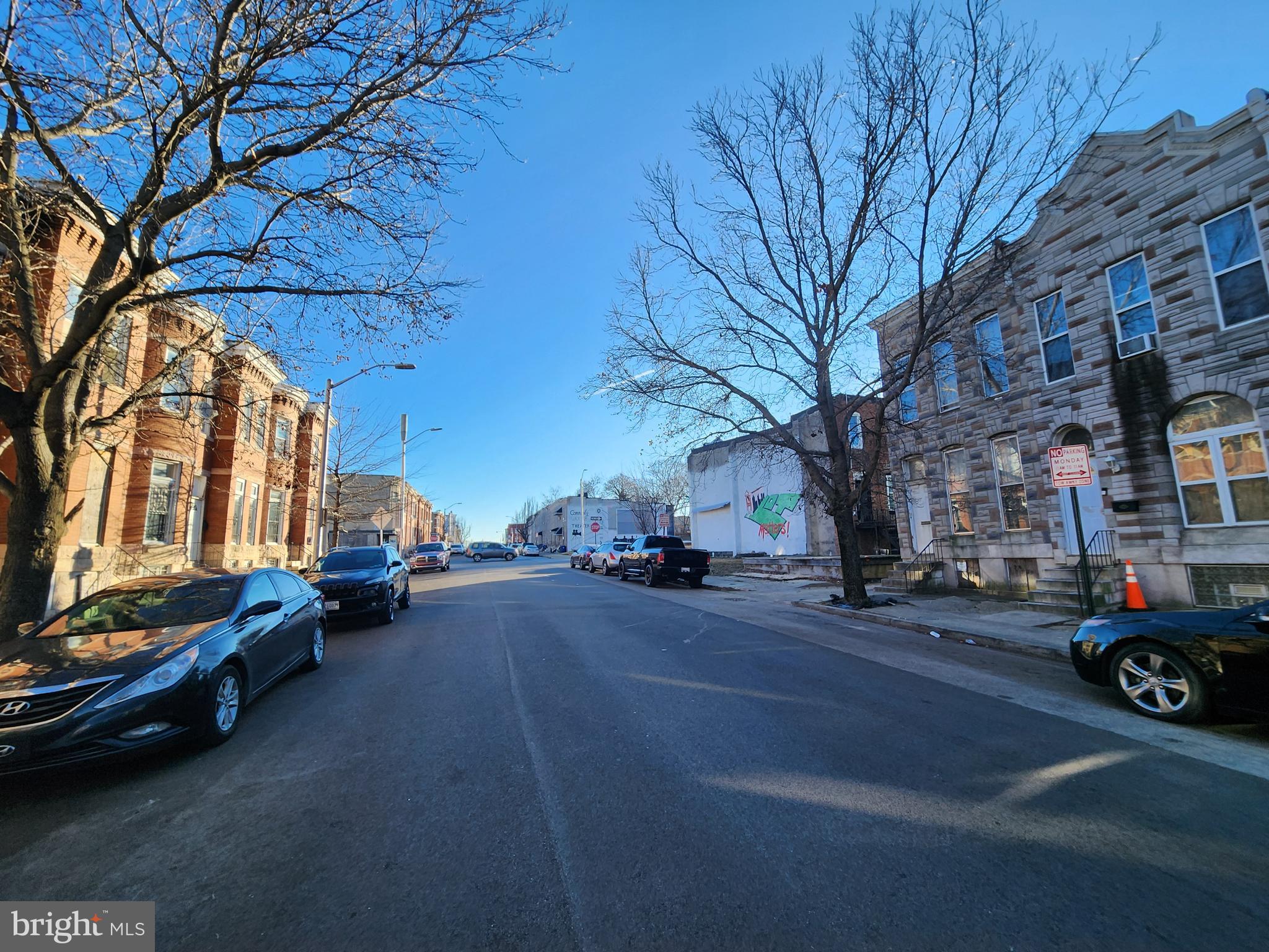 1916 West Lanvale Street Baltimore, MD 21217 - Photo 14 of 15 a car parked on the side of a street