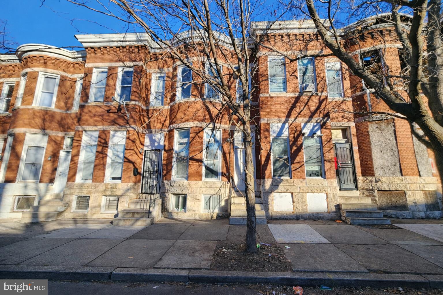 1916 West Lanvale Street Baltimore, MD 21217 - Photo 2 of 15 a front view of a building with trees