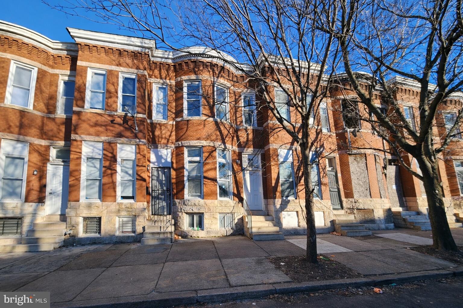 1916 West Lanvale Street Baltimore, MD 21217 - Photo 3 of 15 a view of a building with a yard