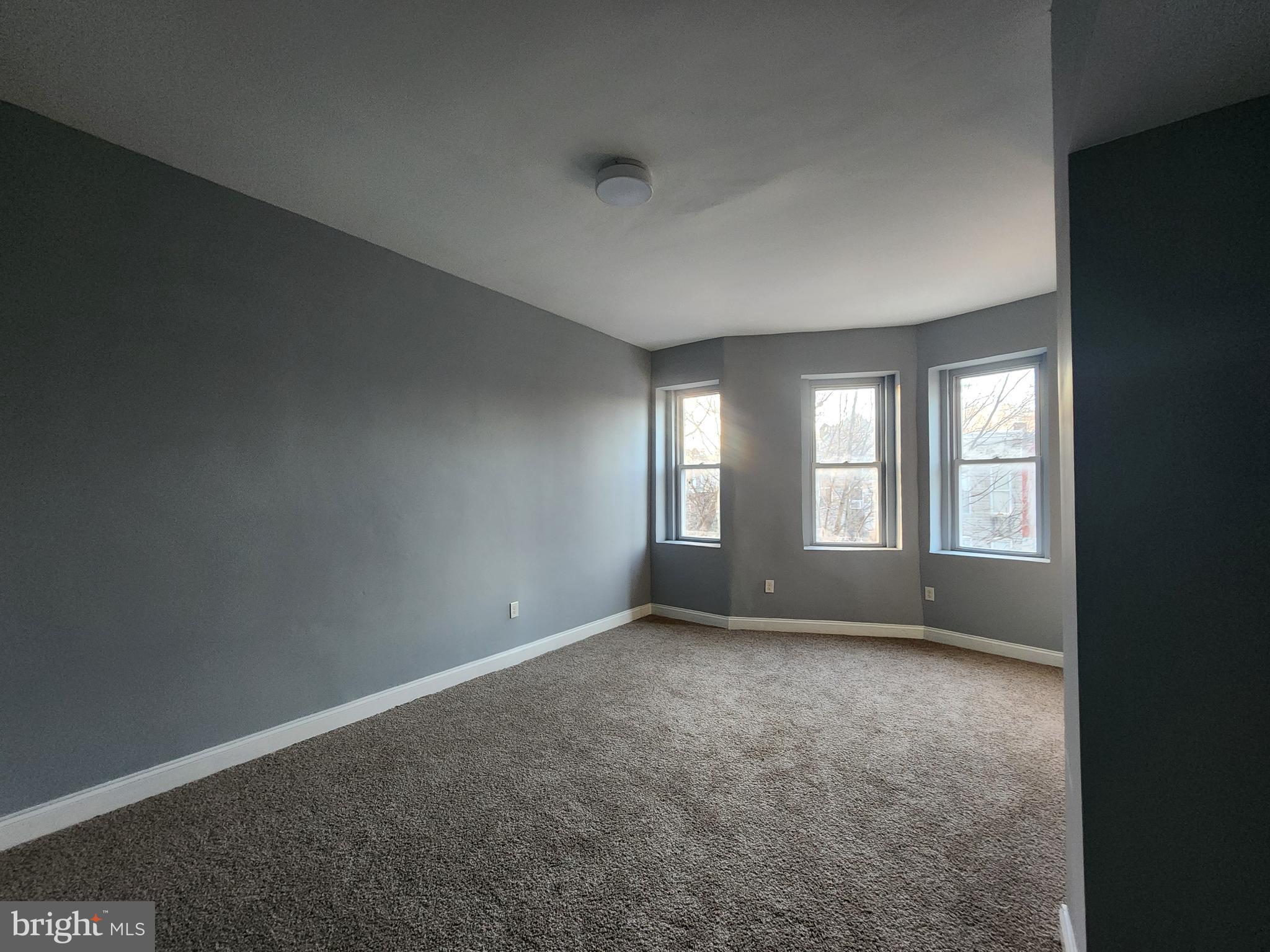 1916 West Lanvale Street Baltimore, MD 21217 - Photo 8 of 15 an empty room with windows