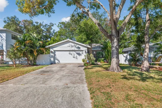 a house with trees in front of it