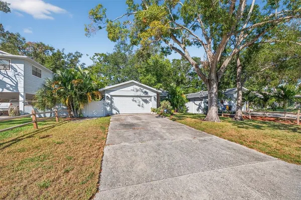 a house with trees in front of it