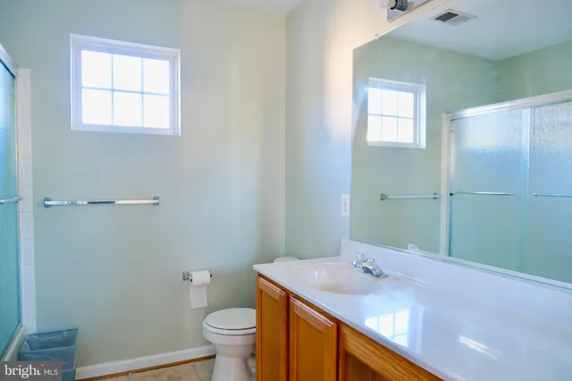 a bathroom with a sink and toilet