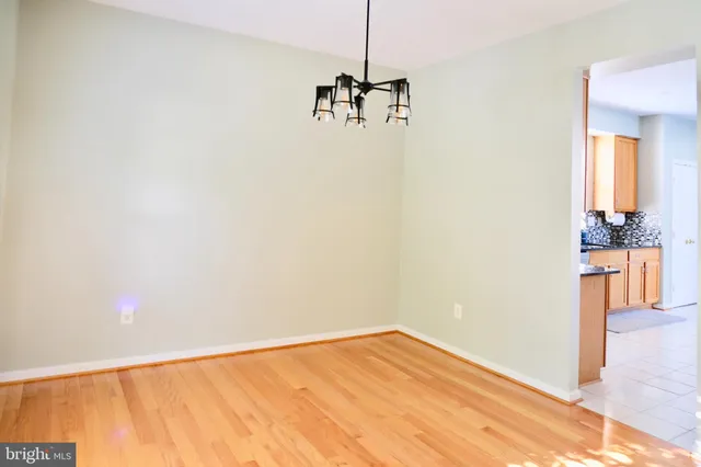 a view of a room with a large window