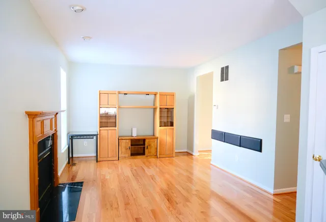 a view of livingroom with hardwood and furniture