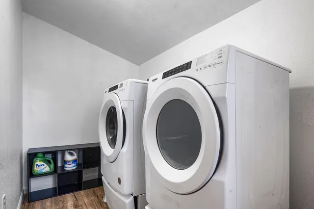 a utility room with dryer and washer