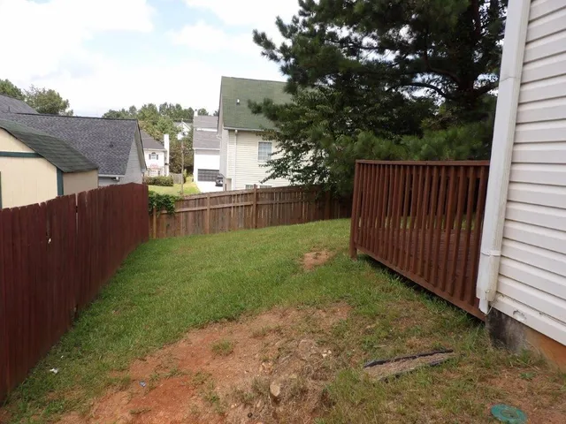 a view of a backyard with a garden