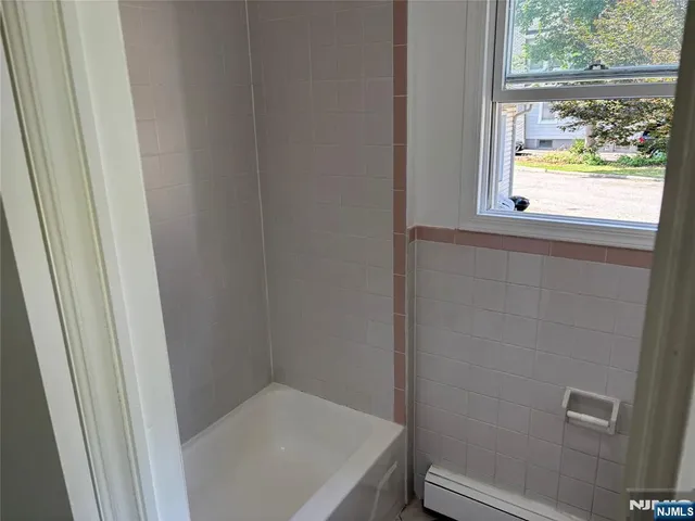 a bathroom with a bathtub