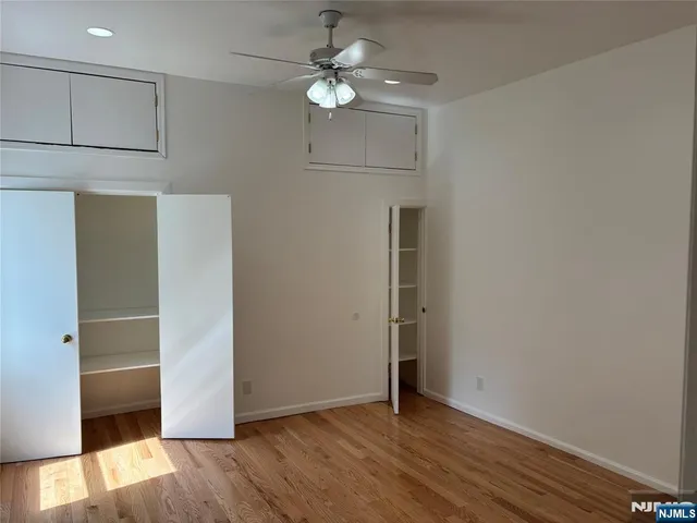 a view of a livingroom with wooden floor