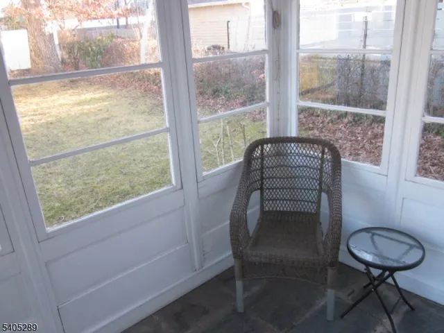 a view of a room with a large window