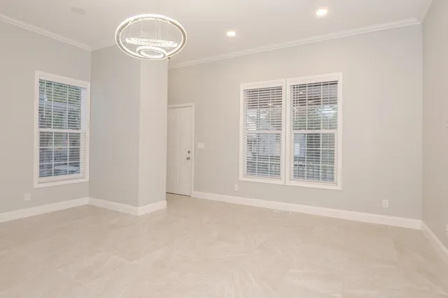 an empty room with windows