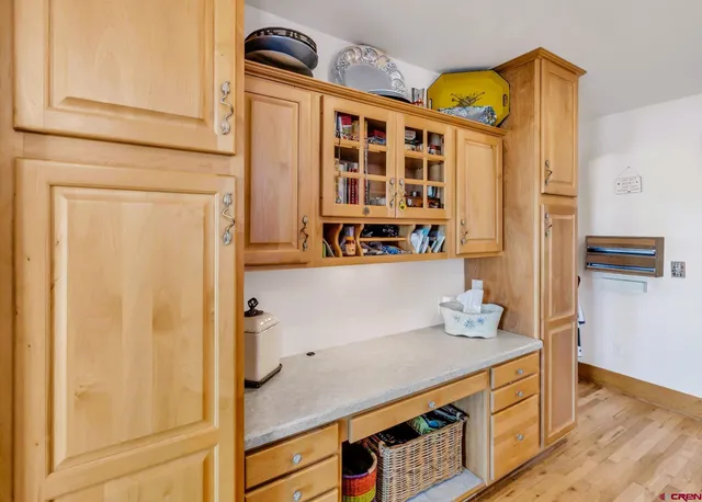 view of hall with wooden floor