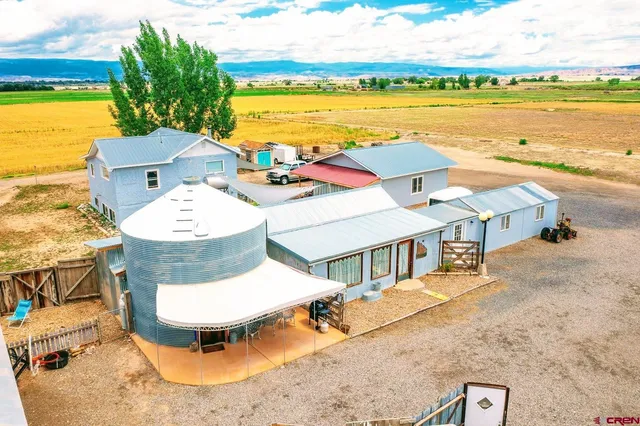 swimming pool view with a seating space