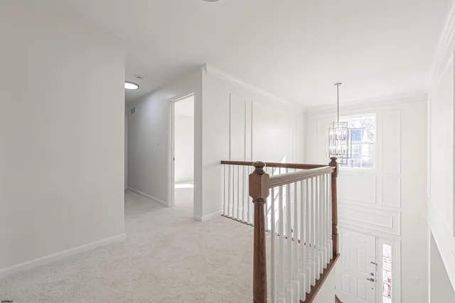 a view of a hallway with entryway