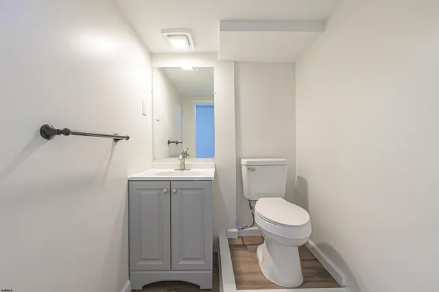 a view of a balcony with wooden floor