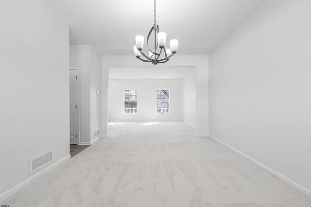 a view of a chandelier in a room