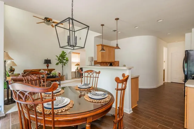 a view of a dining room with furniture