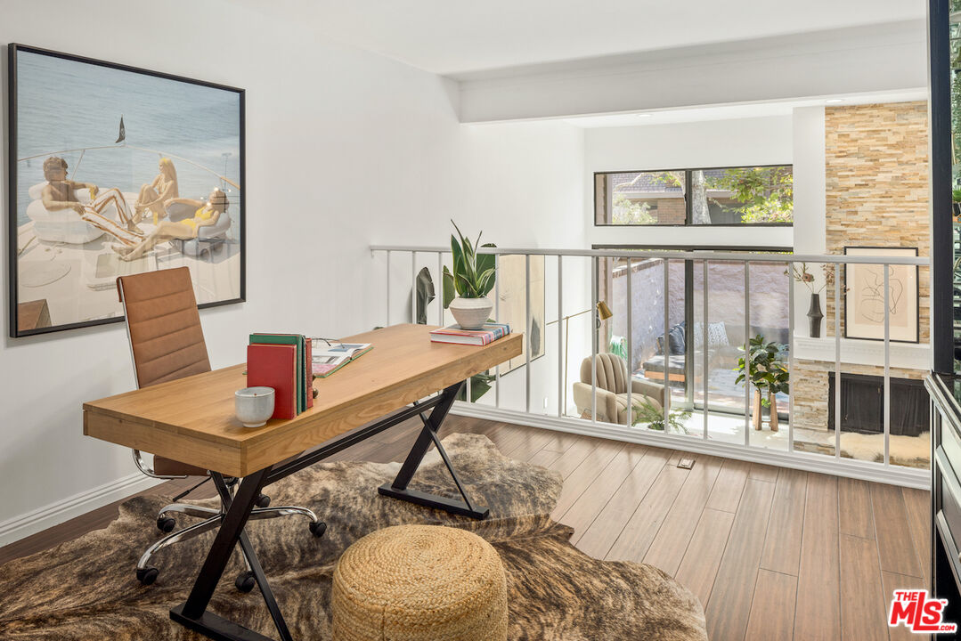 4549 Alla Road, Unit 5 Marina del Rey, CA 90292 - Photo 11 of 35 a living room with furniture and a large window