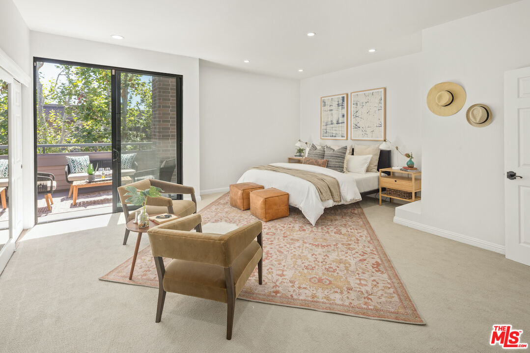 4549 Alla Road, Unit 5 Marina del Rey, CA 90292 - Photo 22 of 35 a bedroom with furniture and a large window