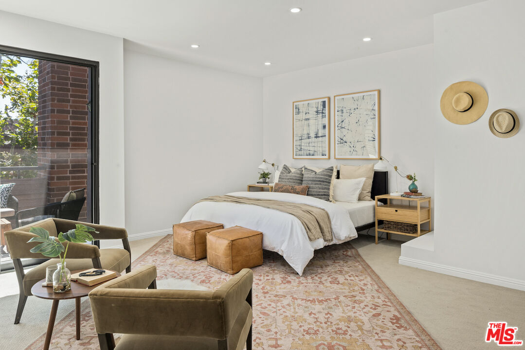 4549 Alla Road, Unit 5 Marina del Rey, CA 90292 - Photo 23 of 35 a bedroom with furniture and wooden floor