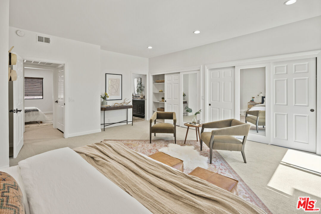 4549 Alla Road, Unit 5 Marina del Rey, CA 90292 - Photo 26 of 35 a bedroom with furniture and a wooden floor