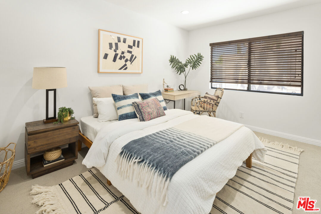 4549 Alla Road, Unit 5 Marina del Rey, CA 90292 - Photo 30 of 35 a bedroom with a bed and a window