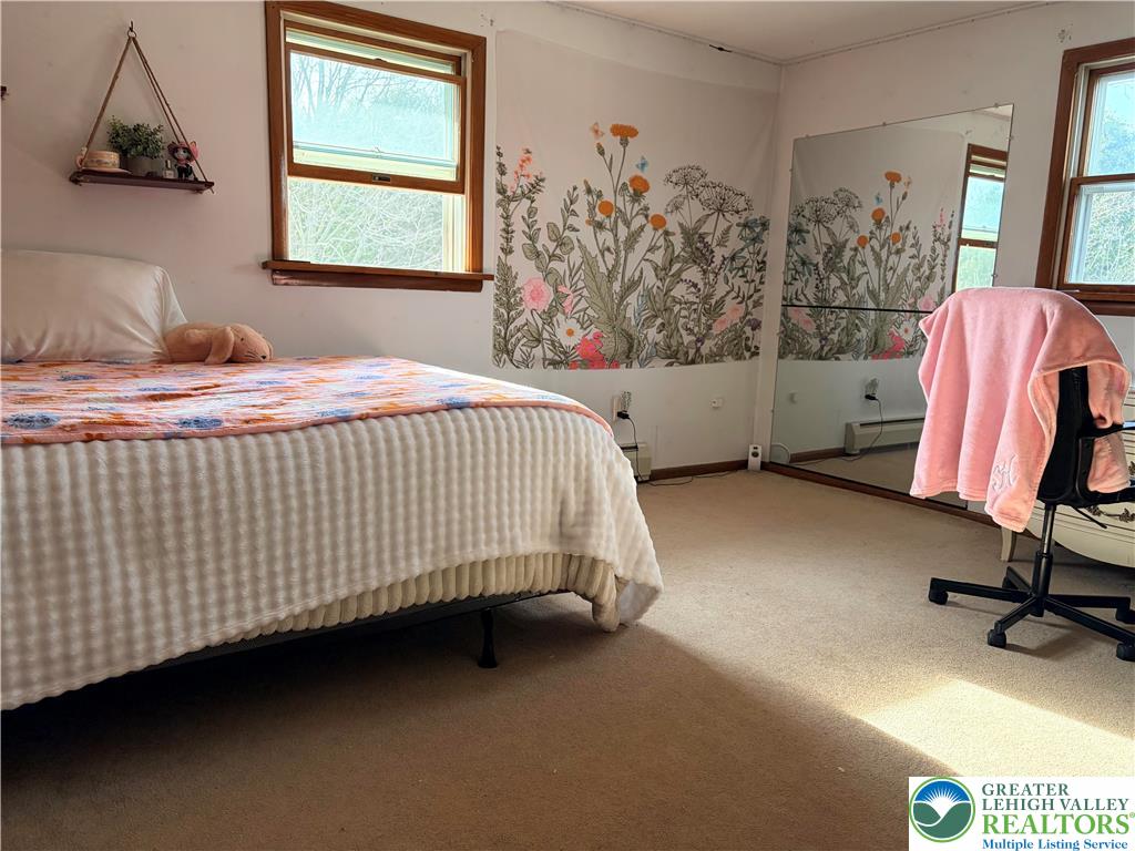 100 Hazelwood Road Lehighton, PA 18235 - Photo 27 of 31 a bedroom with a bed and window