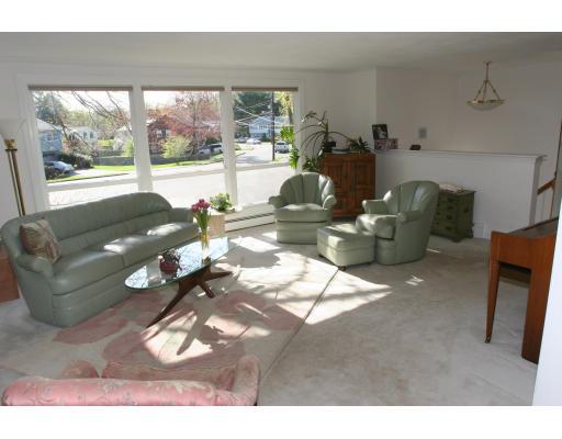 42 Hewitt Circle Needham, MA 02494 - Photo 6 of 10 a living room with furniture and a large window