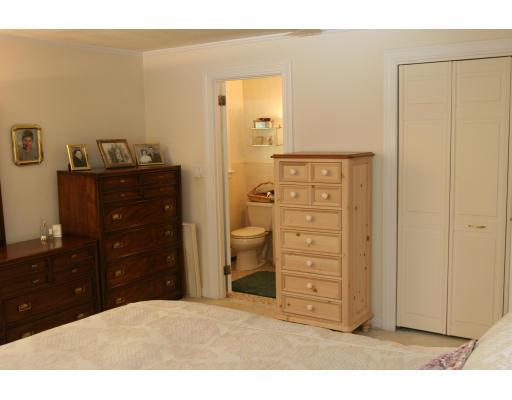 42 Hewitt Circle Needham, MA 02494 - Photo 8 of 10 a bedroom with a bed and a dresser