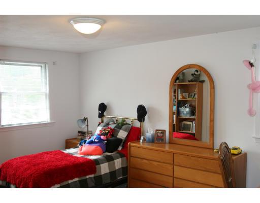42 Hewitt Circle Needham, MA 02494 - Photo 9 of 10 a bedroom with furniture and a window