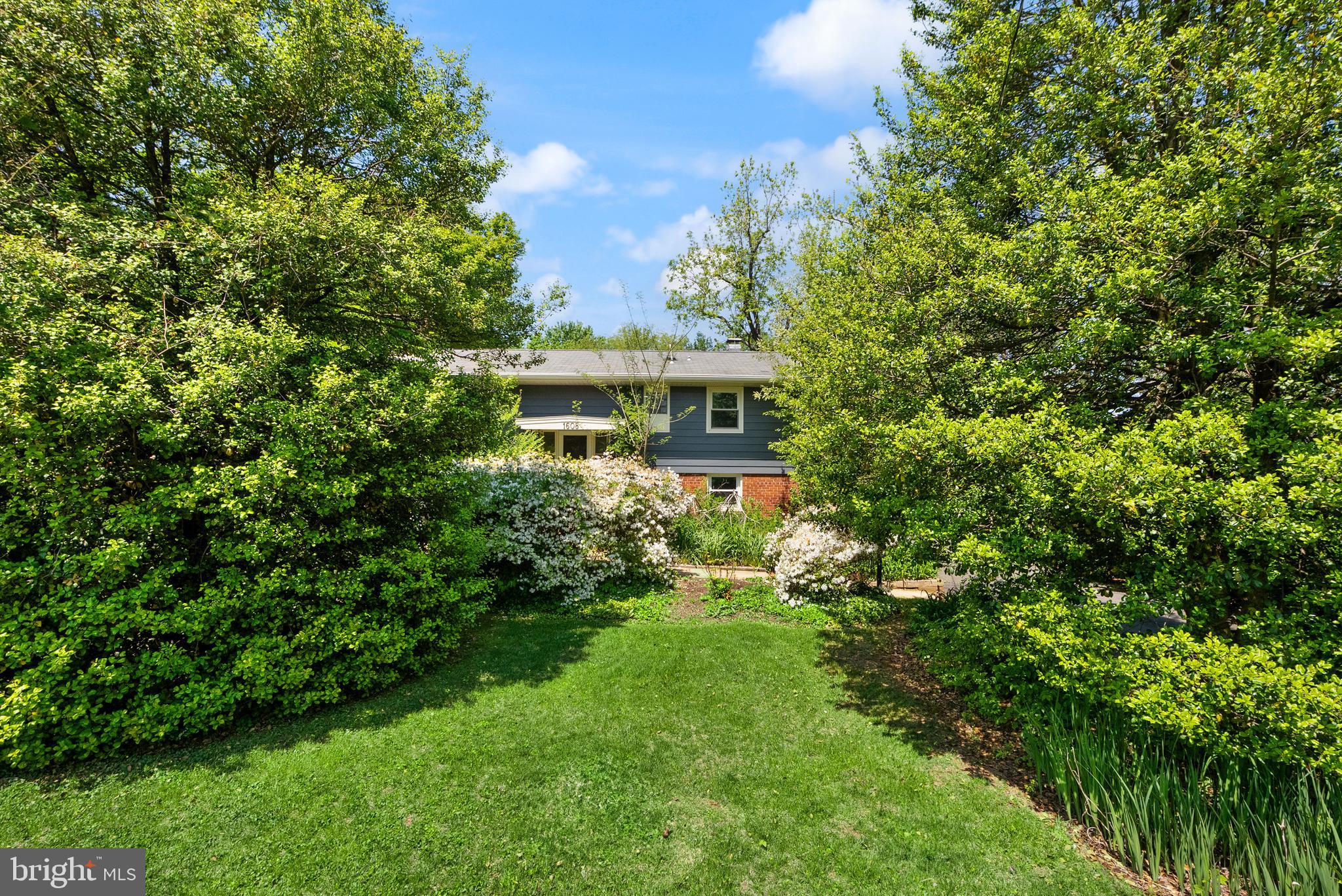 1608 Chain Bridge Road McLean, VA 22101 - Photo 3 of 30 a view of a house with a yard