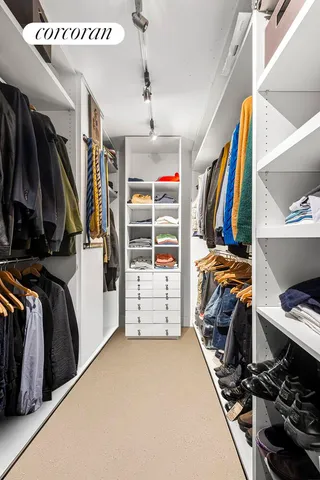 a reading room with a book shelf and a book shelf