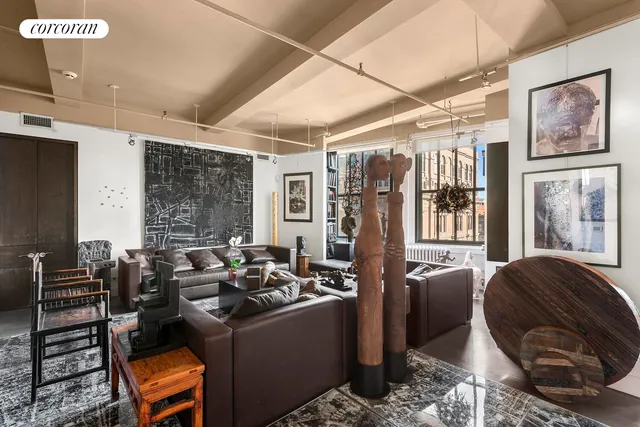 a kitchen with a table chairs stove and cabinets