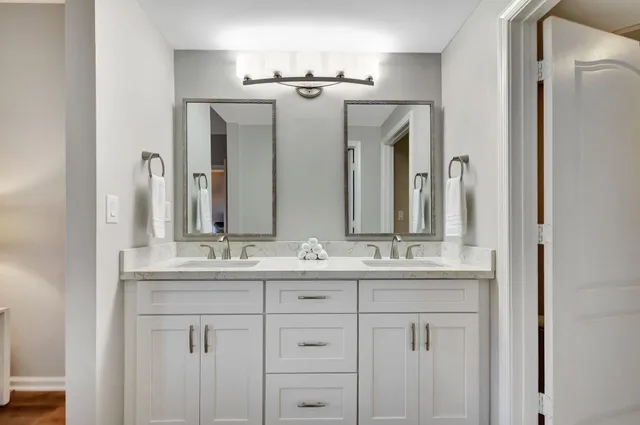 a bathroom with a bathtub and shower