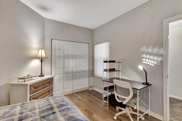 a view of a glass door and a balcony