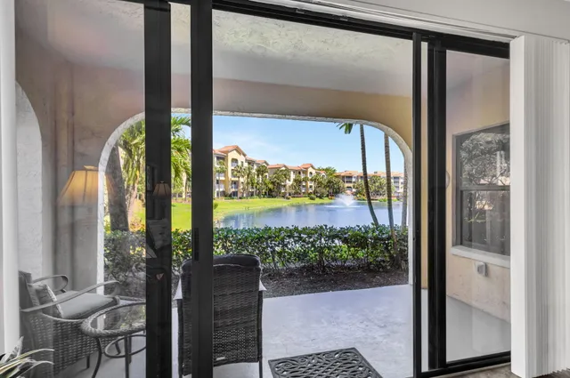 a view of a lake with a building in the background