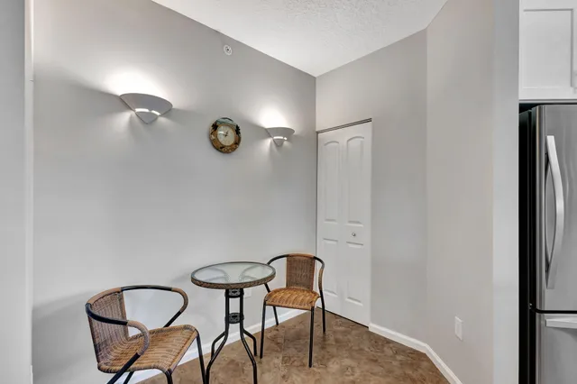 a view of a kitchen and dining room with furniture