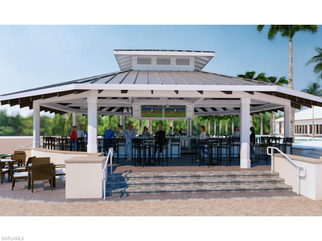 14591 Edgewater Circle Naples, FL 34114 - Photo 16 of 36 New community sports bar with tv for all year round sports and camaraderie with other residents