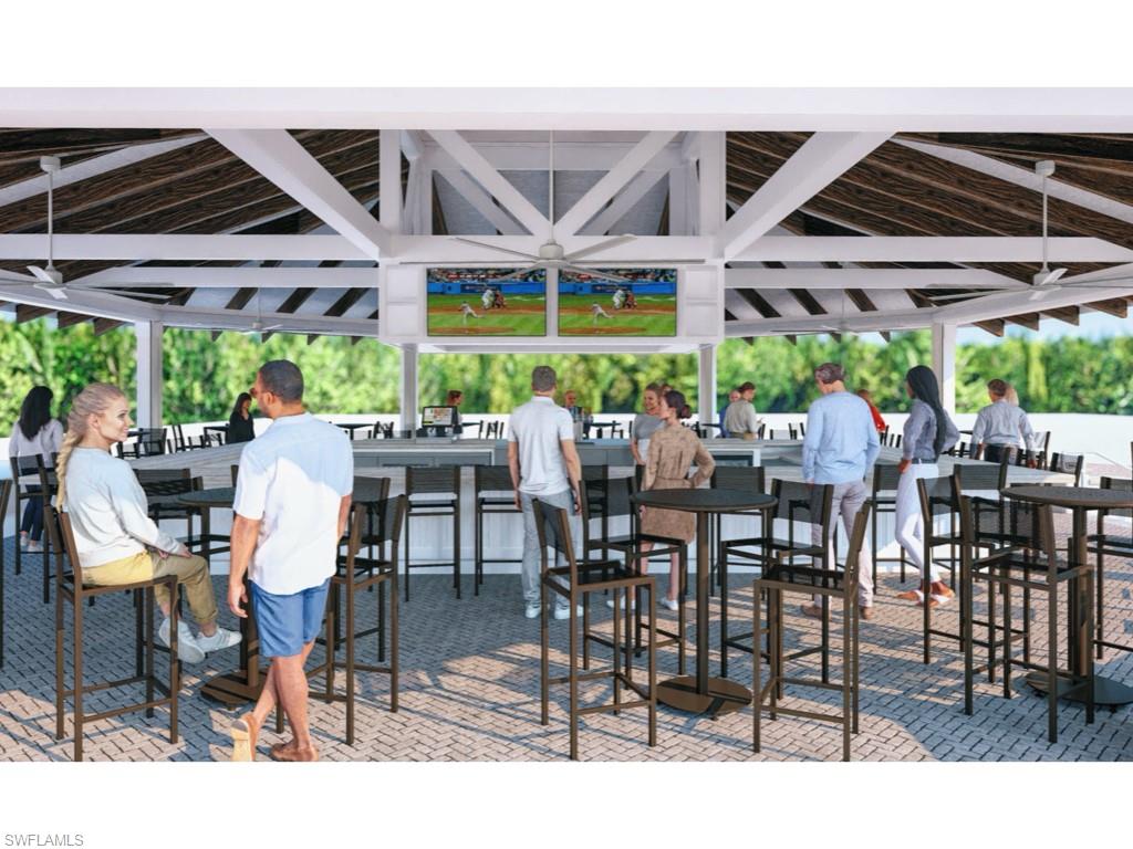 14591 Edgewater Circle Naples, FL 34114 - Photo 18 of 36 View of new sports bar with tvs and high top tables for your enjoyment