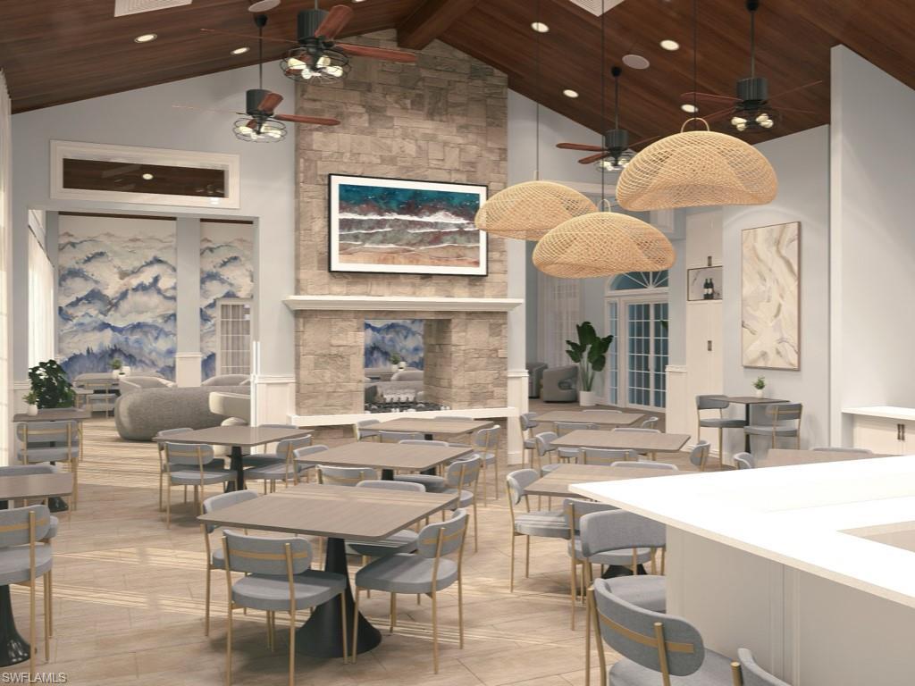 14591 Edgewater Circle Naples, FL 34114 - Photo 21 of 36 Clubhouse main room featuring a ceiling fan, a high wooden ceiling, and recessed lighting