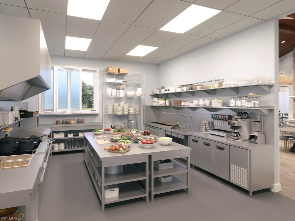 14591 Edgewater Circle Naples, FL 34114 - Photo 23 of 36 New Kitchen with open shelves, light countertops, and state of the art equipment to enhance our new restaurant opening soon