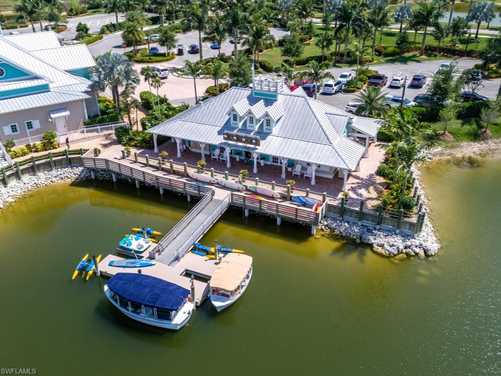 14591 Edgewater Circle Naples, FL 34114 - Photo 26 of 36 Aerial view of Outrigger where you can take a boat ride, use a kayak or ride a bicycle with no fees enjoy all that Florida outdoor living has to offer
