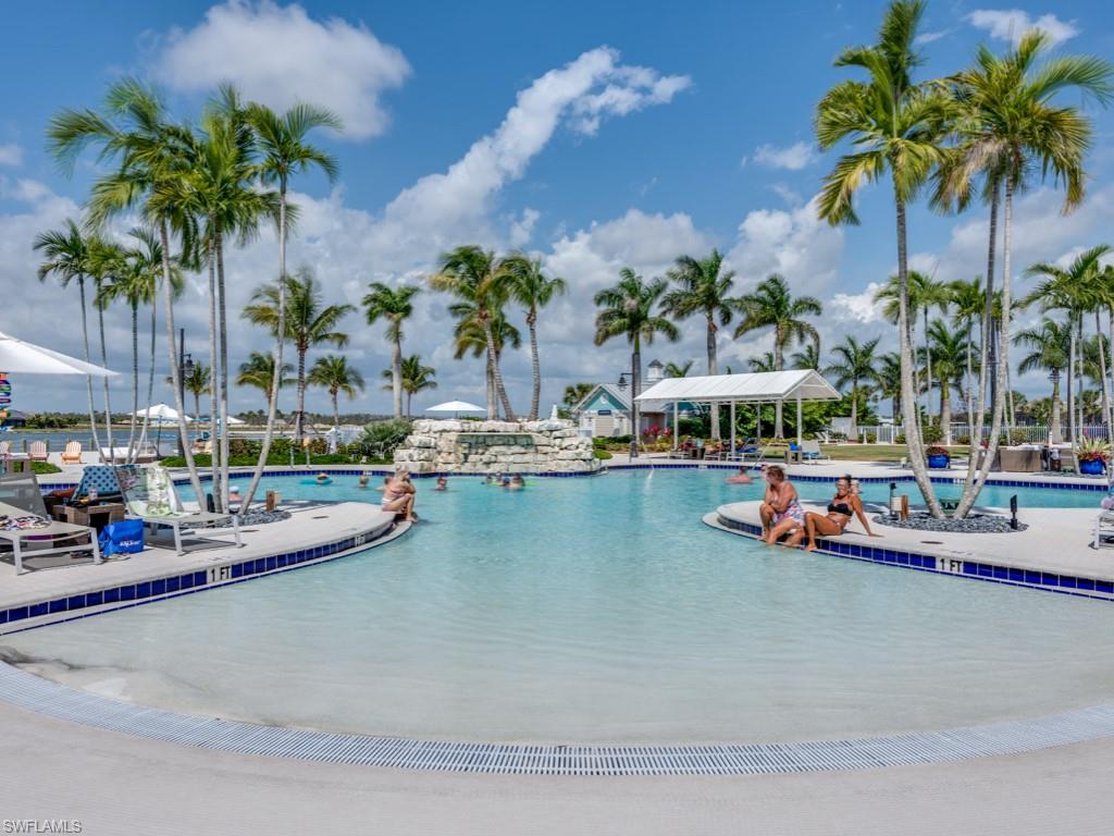 14591 Edgewater Circle Naples, FL 34114 - Photo 29 of 36 Zero entrance pool enjoy daily water aerobics or a swim. in the lap pool for great exercise