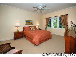 52 Carriage Spring Way Hendersonville, NC 28791 - Photo 9 of 12 a bedroom with a bed and window