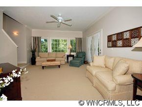 52 Carriage Spring Way Hendersonville, NC 28791 - Photo 10 of 12 a living room with furniture and a large window