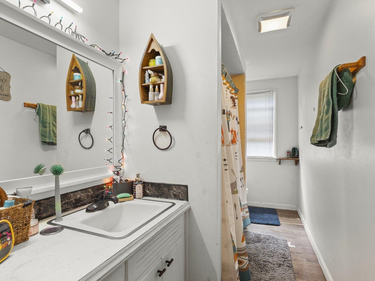1930 North Alpine Road Rockford, IL 61107 - Photo 24 of 34 a bathroom with a sink and mirror
