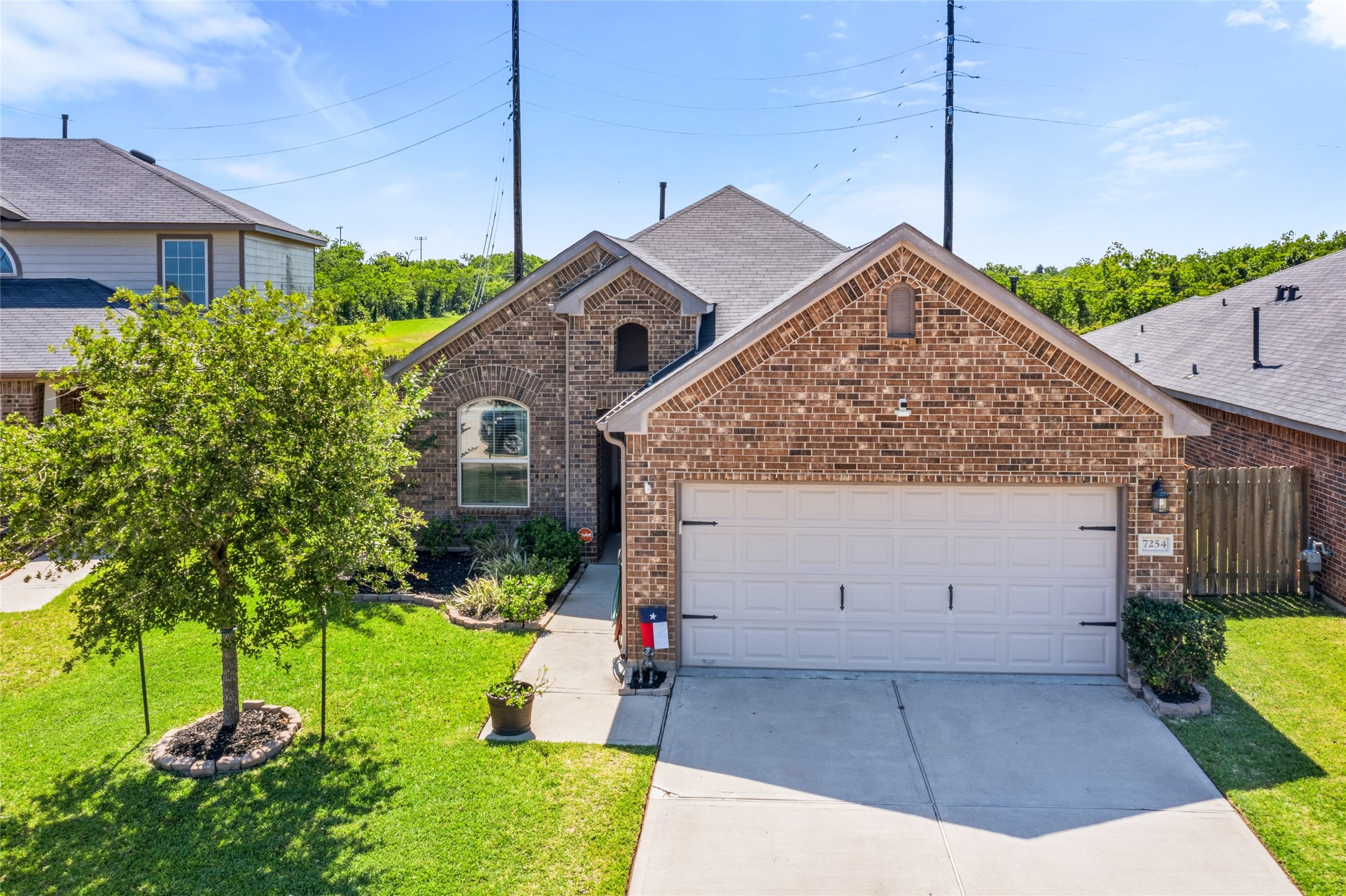 7254 Victorville Drive Rosharon, TX 77583 - Photo 27 of 27 a front view of a house with a yard