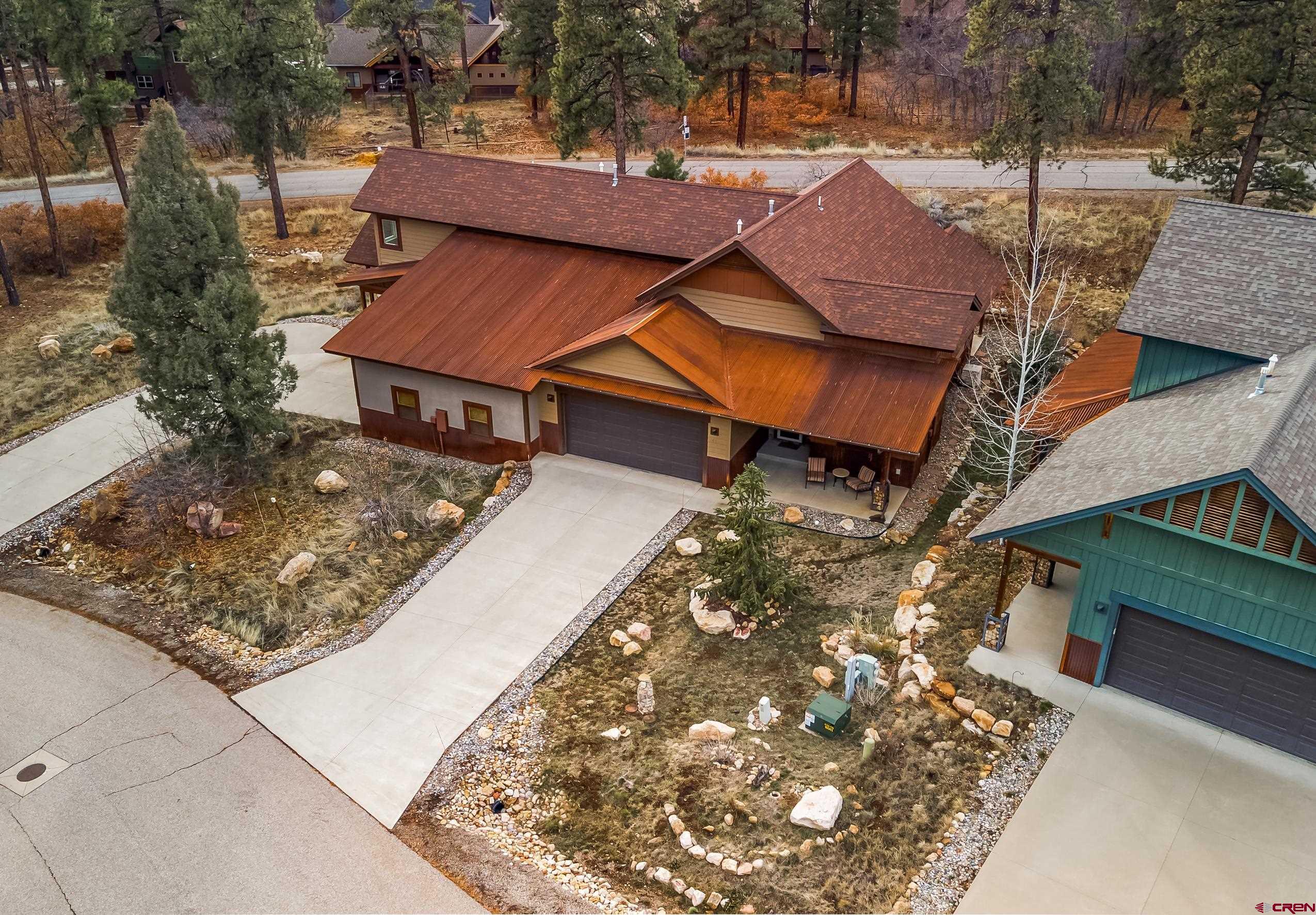 41 Mountain Stream Court Durango, CO 81301 - Photo 27 of 29 a aerial view of a house with large trees